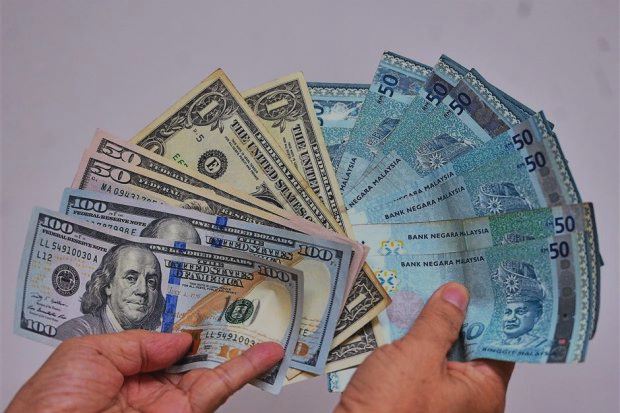 Prestasi terburuk ringgit RM4.50 per AS$1 - penganalisis